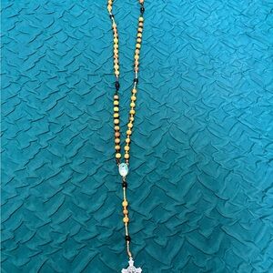 Elegant Beaded Necklace with Gold and Black Accents